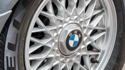 BMW logo on Dubai owner Rupert Diss’s vintage car: The Gerfman car maker is raising prices of some of its SUVs in China. Antonie Robertson / The National