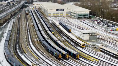 Southeastern trains are parked in sidings near Ashford Station in Kent. PA