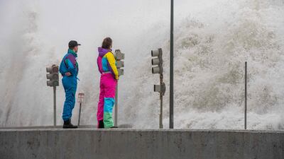 Waves crash over the sea wall in Revere, Massachusetts, amid storms that have caused flooding in much of the north-eastern US. AFP