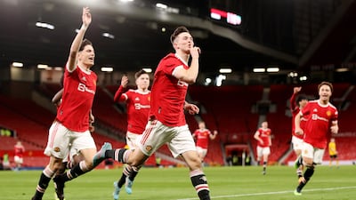 Charlie McNeill of Manchester United celebrates after scoring the third goal during the FA Youth Cup semi-final against Wolverhampton Wanderers at Old Trafford. Getty