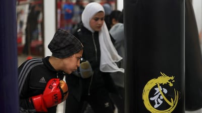 As more joined, they moved out of the garage and began training on the beach