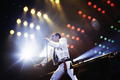 Freddie Mercury performs at a concert at the Palais Omnisports de Paris Bercy. AFP