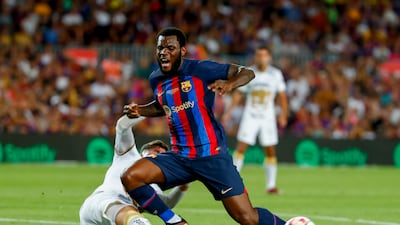 Franck Kessie 7 - On at half time, the new midfielder signed from AC Milan has impressed Xavi pre-season and he crossed for Aubameyang for the fifth. AP Photo