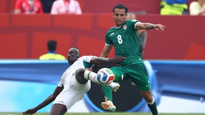 Senegal's midfielder #26 Pape Gueye and Iraq's midfielder #08 Ibrahim Bayesh fight for the ball during the 2026 World Cup Group I football match between Senegal and Iraq at the Toronto Stadium in Toronto. AFP