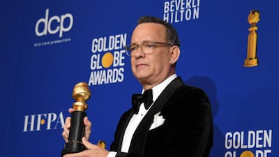 Tom Hanks poses with his Cecil B DeMille Award during the 77th annual Golden Globe Awards on January 5, 2020, at The Beverly Hilton hotel in Beverly Hills, California. Reuters