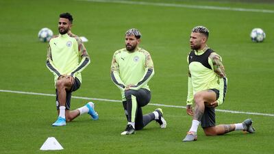 Left to right: Riyad Mahrez, Sergio Aguero and Nicolas Otamendi during training. Reuters