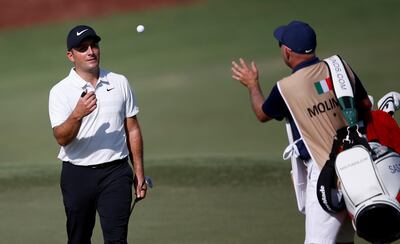 Francesco Molinari, left, is still the favourite to clinch the Race to Dubai gong at the end of the tournament on Sunday. EPA