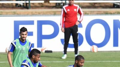 UAE football player Abdelaziz Sanqour, right, dribbles away from Mohammed Ahmed, left, on Wednesday during a team training session ahead of the 2015 Asian Cup.