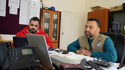 Mortada Mhanna, right, the head of Tyre's Disaster Management Unit, is prepared to be the last person standing in the city. The National