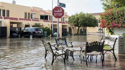 A table and chairs outside a resident's house sit in the water as the storm passes through. Courtesy Tara Atkinson