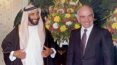 Sheikh Zayed with Jordan's King Hussein in Abu Dhabi in the 1990s. Wam / AFP