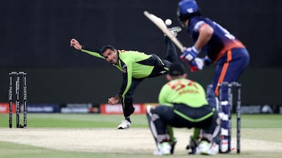 UAE spinner Sultan Ahmad bowls during Qalandars' Abu Dhabi T10 game against Maratha Arabians in November 2019. Chris Whiteoak / The National