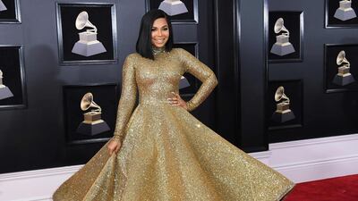 R&B legend Ashanti opted for a fun full-skirt affair by Yas Couture by Elie Madi. Fast fact: Elie Madi is a Kuwait-based Lebanese designer. Angela Weiss / AFP
