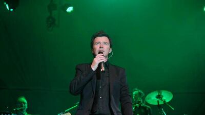 Rick Astley performs on the second day of the Singfest music festival at Fort Canning Park on August 3, 2008 in Singapore. Stefen Chow / Getty Images