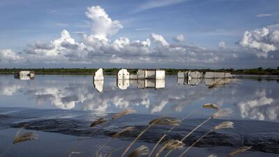 A view of an abandoned house destroyed by the mudflow in Sidoarjo. The mudflow eruption is suspected to have been triggered by the drilling activities of the oil and gas company, Lapindo Brantas, although it refutes the claims, instead blaming a 6.3 magnitude earthquake that struck a neighboring city two days before. According to reports, 20 lives were lost and nearly 40,000 people displaced, with damages topping $2.7 billion. Even now, mud geysers continue to spurt daily and high levels of heavy metals have been detected in nearby rivers. Ulet Ifansasti / Getty Images