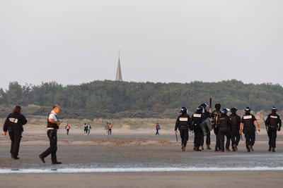 French police patrol the beach at Gravelines, northern France, as migrants seek to cross the Channel to England. AFP