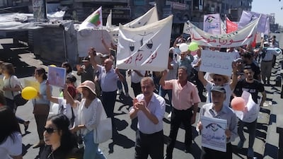 Pro-democracy demonstrators march in the southern city of Suweida, on August 16, 2022, at the one year anniversary celebration of the protest movement against President Bashar Al Assad, in the mostly Druze province. Photo: Suhail Thubian.
