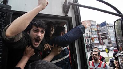 Protesters are arrested by riot police in Taksim Square for an illegal May Day rally in Istanbul. EPA