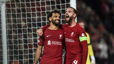 Mohamed Salah celebrates with Jordan Henderson after scoring. EPA