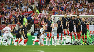 Trippier bends his free kick over the wall. Matthias Hangst / Getty Images