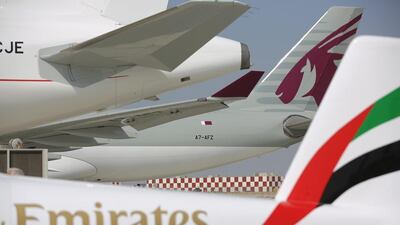 Emirates today took off for Auckland, while Qatar Airways, pictured rear, plans to follow suit. Getty Images