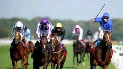 Mickael Barzalona took Encke, right, inside to upset the favoured Camelot, second from the left, in the St Leger Stakes at Doncaster, England.