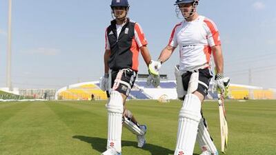 England openers Alastair Cook, left, and Andrew Strauss, head to the practice nets in Abu Dhabi.