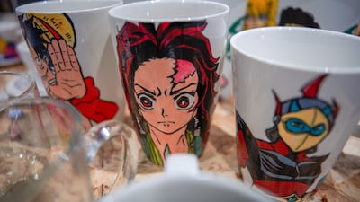 Ameera of Princess Designs custom art mugs.