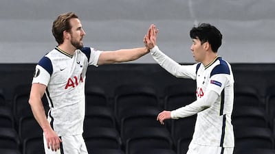 Harry Kane celebrates with Son Heung-min after scoring. against Dinamo Zagreb on March 11. PA