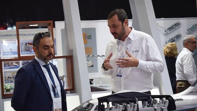 Company representatives explain how the plane works.