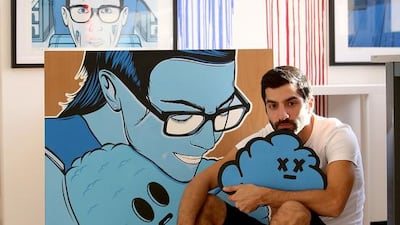 Marwan Shakarchi, who paints under the moniker Myneandyours, with his artworks at Tashkeel Studio. Pawan Singh / The National