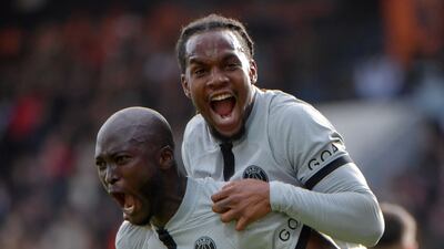 Paris Saint-Germain's Danilo Pereira, left, celebrates with Renato Sanches after scoring the winner in the 2-1 Ligue 1 victory at Lorient on November 6, 2022. AFP