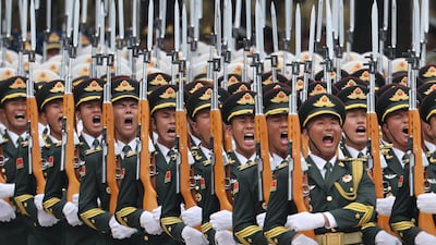 Chinese People's Liberation Army guards march during the welcome ceremony for President Putin. EPA