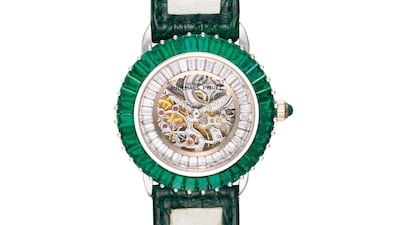 An Audemars Piguet skeletonised women's model set with diamonds and emeralds, at Christie's.