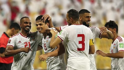 Fabio De Lima, second left, celebrates scoring in the UAE's 4-0 win over Malaysia in their World cup qualifier at the Zabeel Stadium in Dubai on Thursday, June 2. Chris Whiteoak / The National