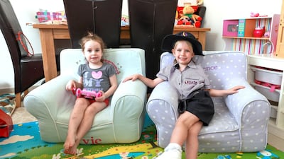 Parents are facing rising costs to buy school uniforms. Victor Besa / The National Section