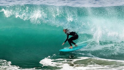 A surfer rides a wave at the Wedge in Newport Beach, California, US. AP