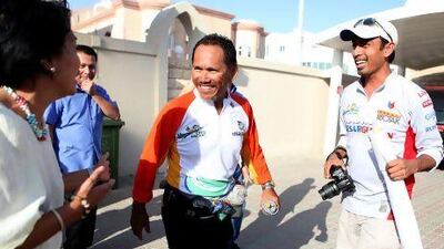 Cesar Guarin, a Filipino marathon runner. His goal is to set a record as the first Filipino and first Asian global runner, covering 42,000km across 47 countries.