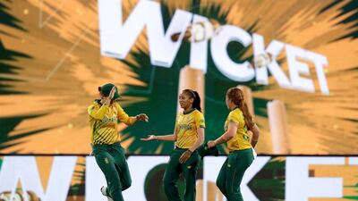 South Africa fielder Shabnim Ismail, centre, is congratulated by teammates after taking a catch to dismiss Australia's Jess Jonassen during the Women's T20 World Cup cricket semi-final against Australia at the Sydney Cricket Ground, on Thursday, March 5. AP
