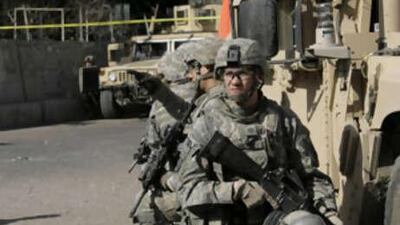 Today, hours before the scheduled vote in parliament, a roadside bomb killed two civilians and wounded four others wounded in central Baghdad, Iraqi officials said.