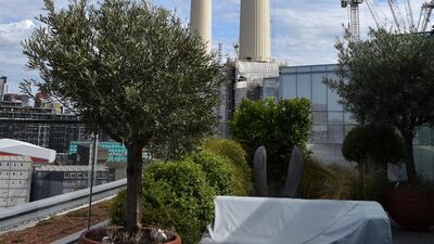 View of Battersea Power Station from a nearby roof deck. Shafi Musaddique / The National