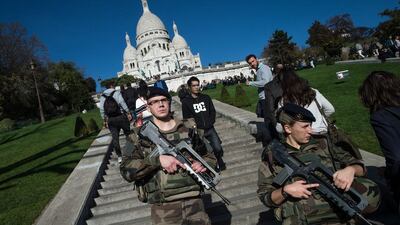 French soldiers guard the Sacre-Coeur cathedral in Paris on November 15, 2015. David Ramos / Getty Images