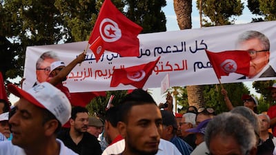Supporters of former Tunisian defence minister and presidential candidate Abdelkrim Zbidi (not pictured) gather during his presidential campagne tour in the central coast city of Monastir. Campaigning for Tunisia's presidential election opened on September 2 with 26 candidates vying to replace late leader Beji Caid Essebsi in a vote seen as vital to defending democratic gains in the cradle of the Arab Spring. AFP