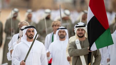 Lt Gen Sheikh Saif bin Zayed, Deputy Prime Minister and Minister of Interior, participates in a traditional ayyala, during the Union Parade, during the Sheikh Zayed Heritage Festival. Abdullah Al Junaibi for the Presidential Court