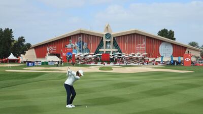 Tommy Fleetwood plays his second shot on the 9th hole. Getty
