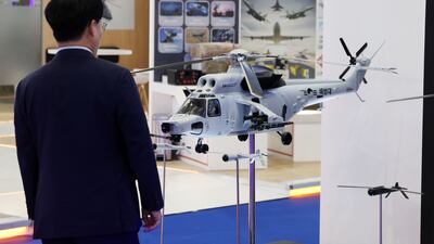 A model of a MAH-1 Marine attack helicopter. It is among the aircraft in the spotlight at the exhibition