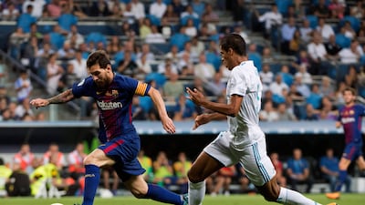 Barcelona's Lionel Messi dribbles with the ball. Curto de la Torre / AFP
