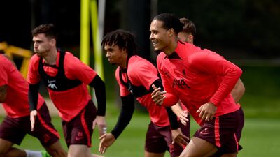 Left to right: Liverpool defenders Andy Robertson, Trent Alexander-Arnold and Virgil van Dijk at the AXA Training Centre ahead of Saturday's game.