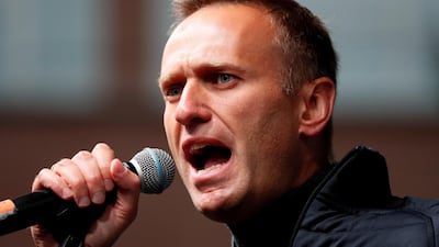 FILE PHOTO: Russian opposition leader Alexei Navalny delivers a speech during a rally to demand the release of jailed protesters, who were detained during opposition demonstrations for fair elections, in Moscow, Russia September 29, 2019. REUTERS/Shamil Zhumatov/File Photo
