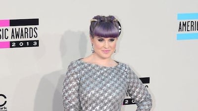 Kelly Osbourne arrives for the 2013 American Music Awards. Frederic J. Brown / AFP Photo